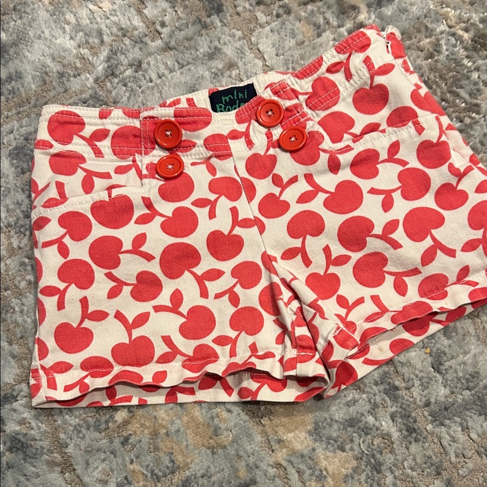 Mini Boden Cream Shorts with Red Apple Print